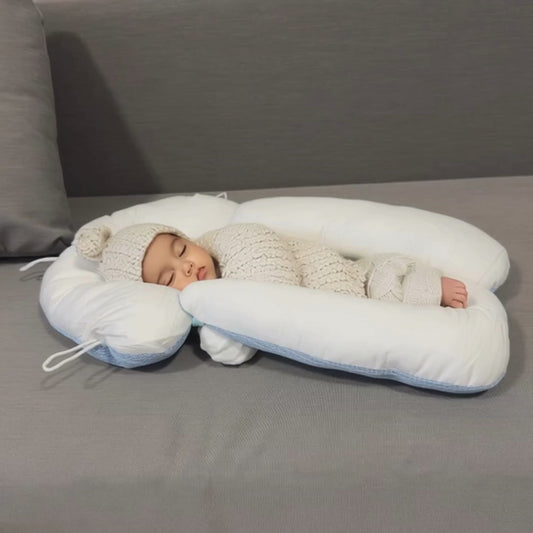 Coccolo - Il Cuscino Studiato e Sicuro per Neonati